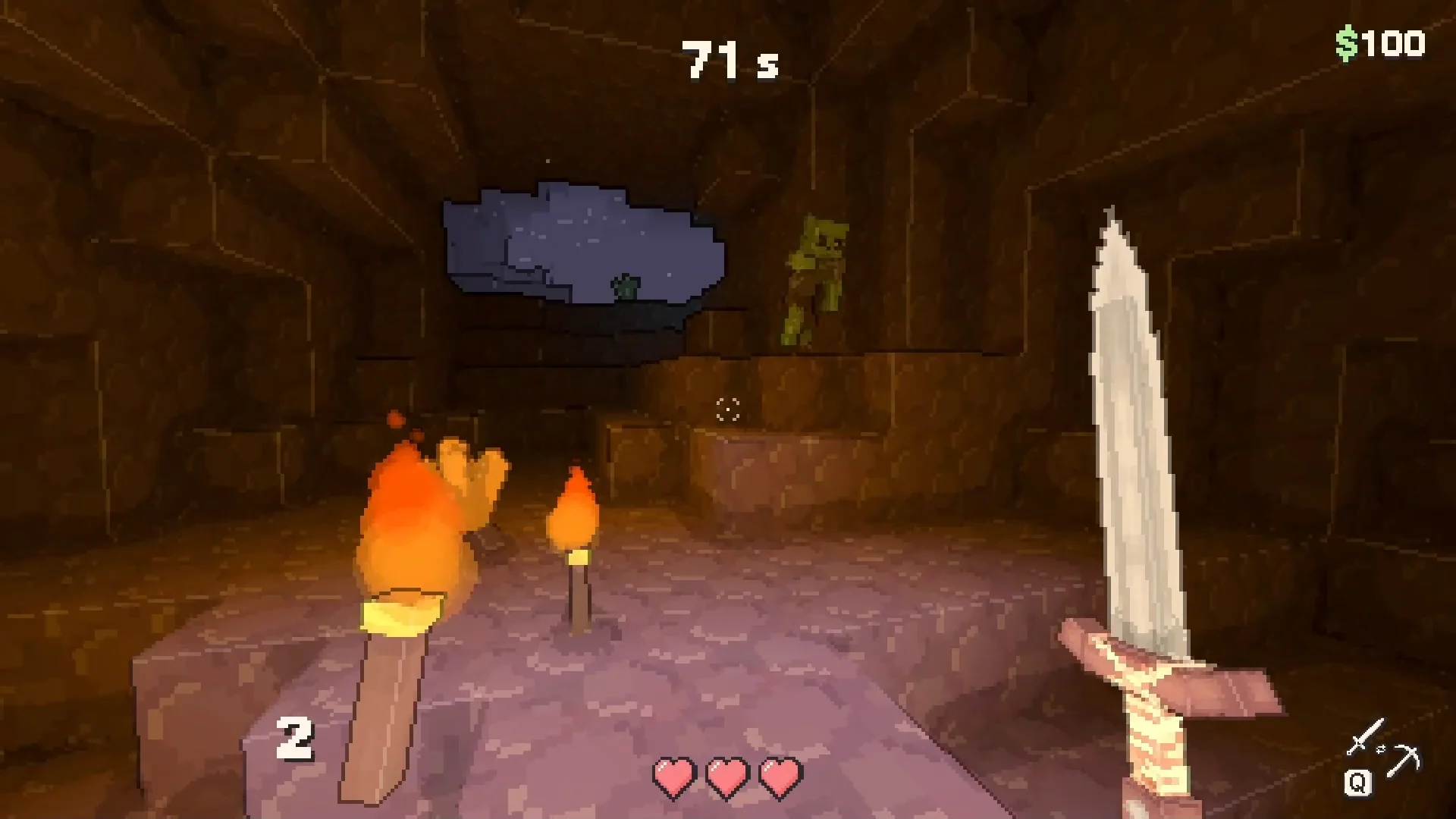A torch lit cave with a sword in hand and a goblin ahead